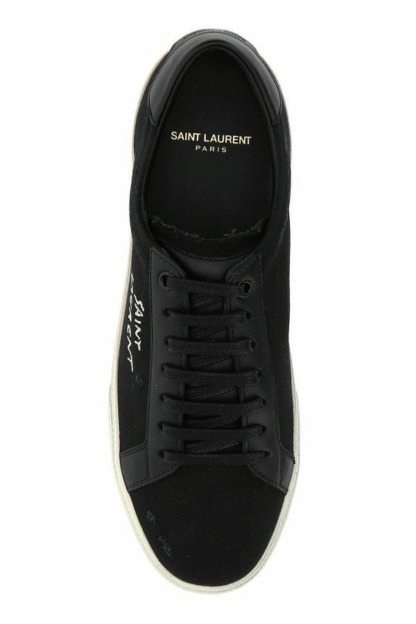 Saint Laurent Baskets basses élégantes en toile et cuir noires