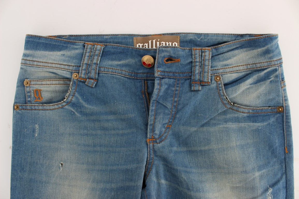 John Galliano Jean slim bleu élégant de créateur