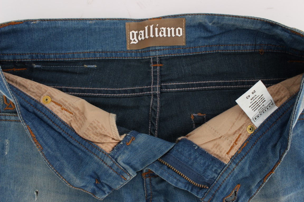 John Galliano Jean slim bleu élégant de créateur