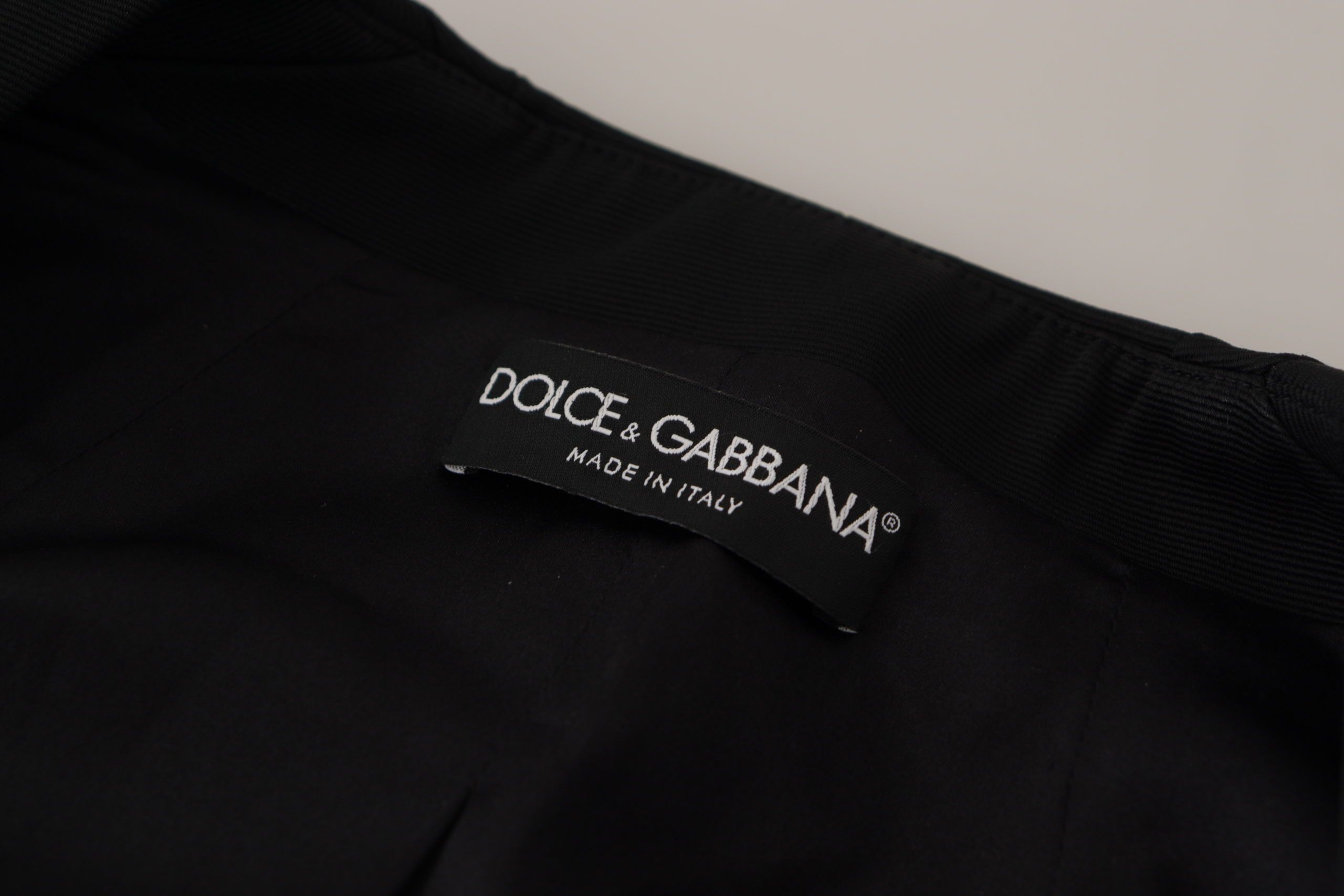 Dolce &amp; Gabbana Veste élégante noire à boutons-pression avec doublure en soie