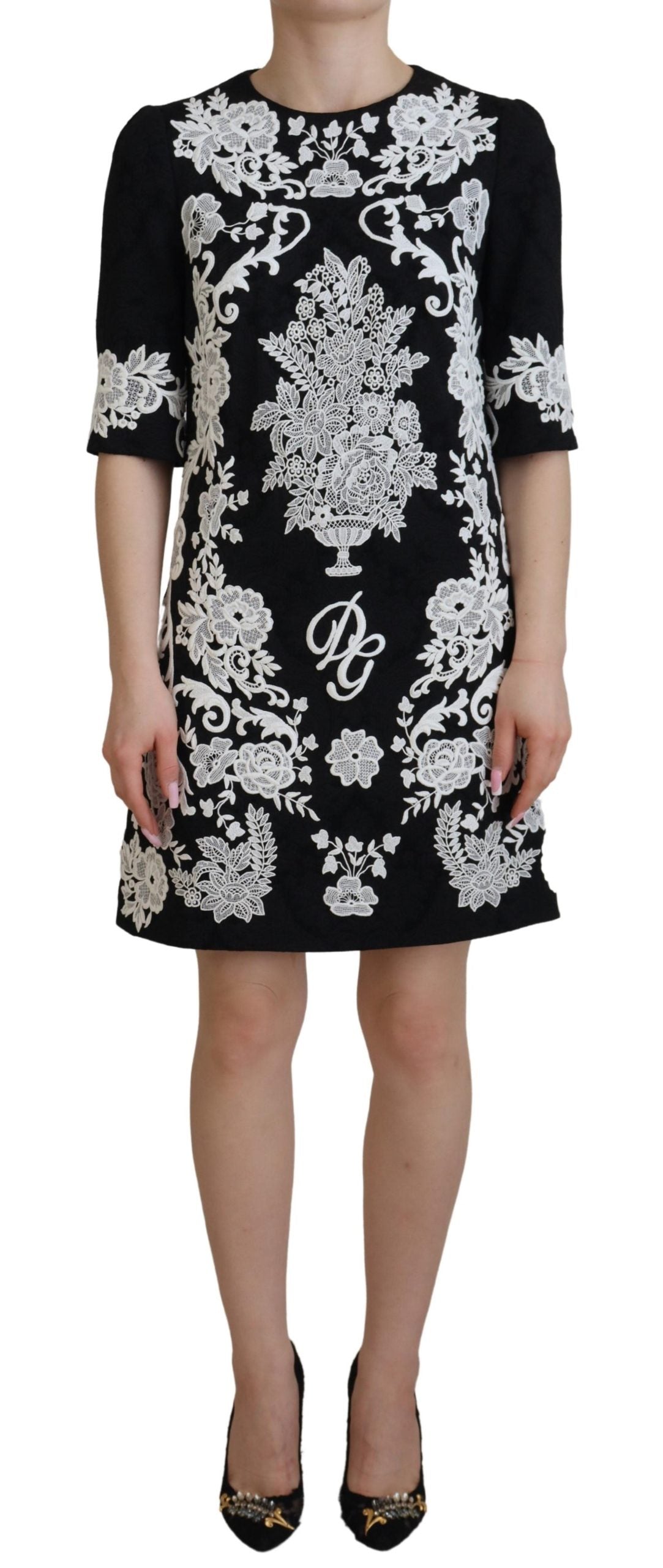 Dolce &amp; Gabbana Mini-robe trapèze noire élégante avec bordure en dentelle