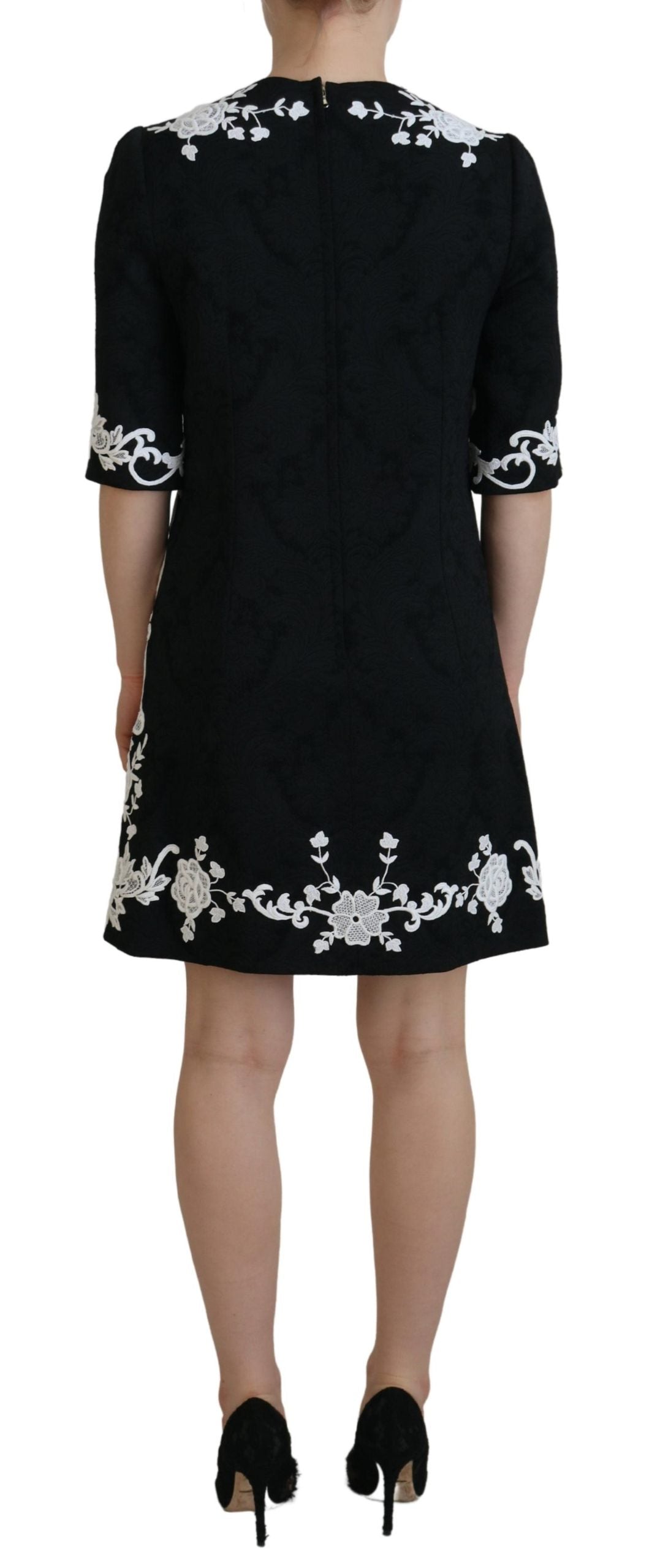 Dolce &amp; Gabbana Mini-robe trapèze noire élégante avec bordure en dentelle