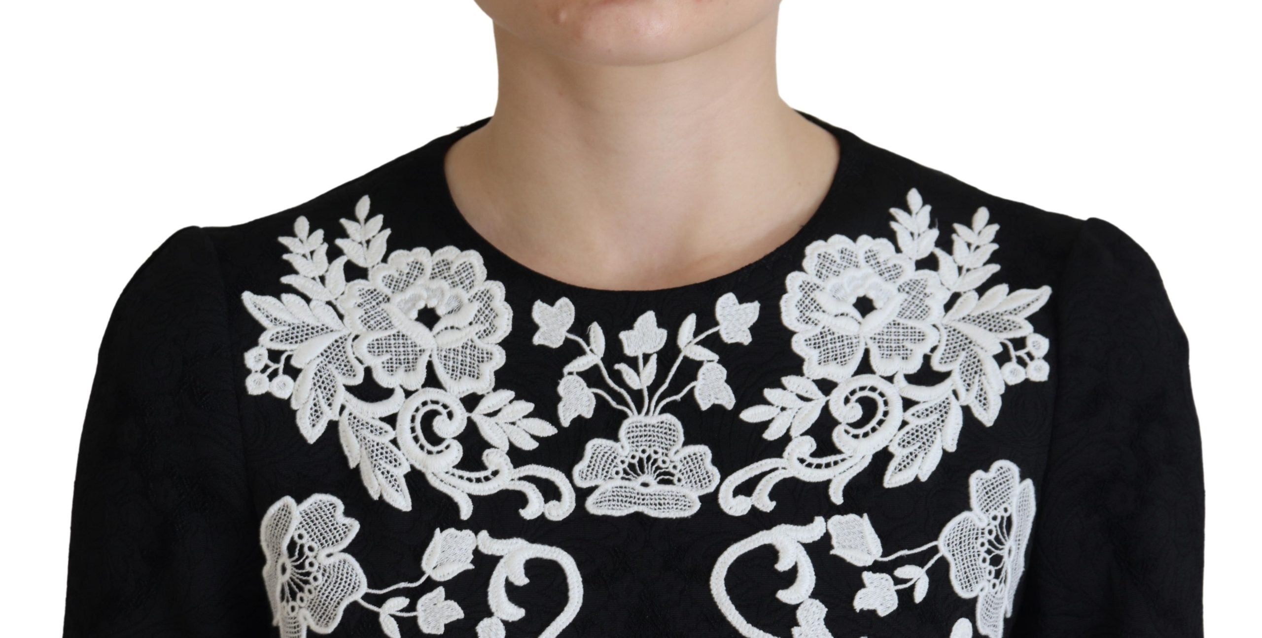 Dolce &amp; Gabbana Mini-robe trapèze noire élégante avec bordure en dentelle