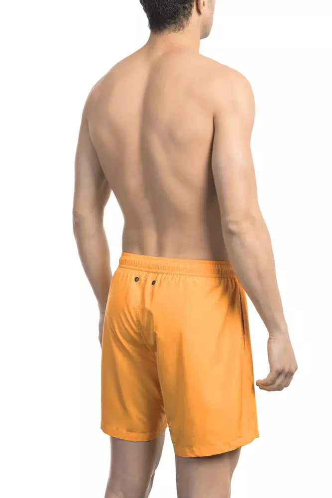 Short de bain Bikkembergs orange électrique avec imprimé emblématique