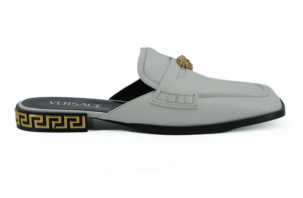 Versace élégantes diapositives plates en cuir blanc