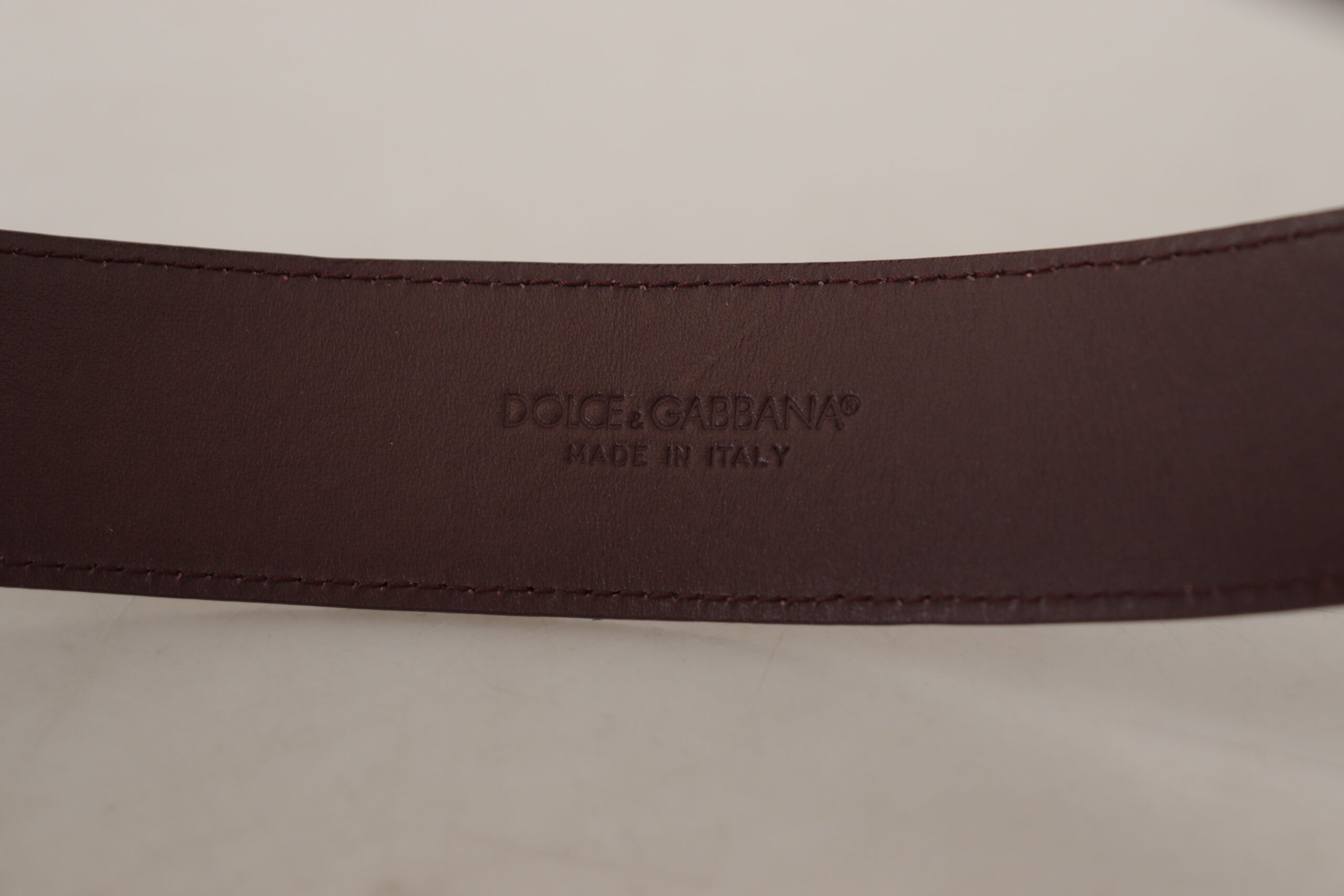 Dolce &amp; Gabbana Ceinture élégante en cuir marron avec boucle gravée