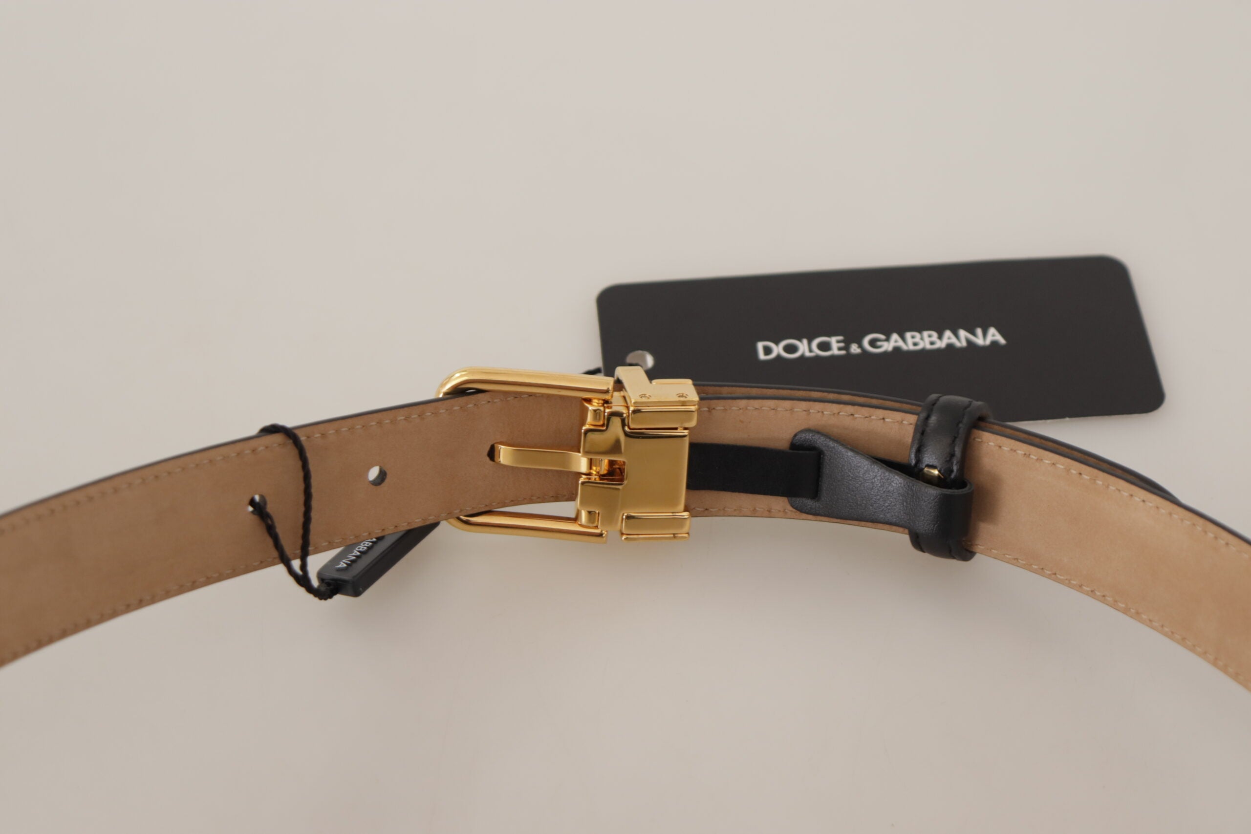 Dolce &amp; Gabbana Ceinture élégante en cuir noir avec boucle gravée