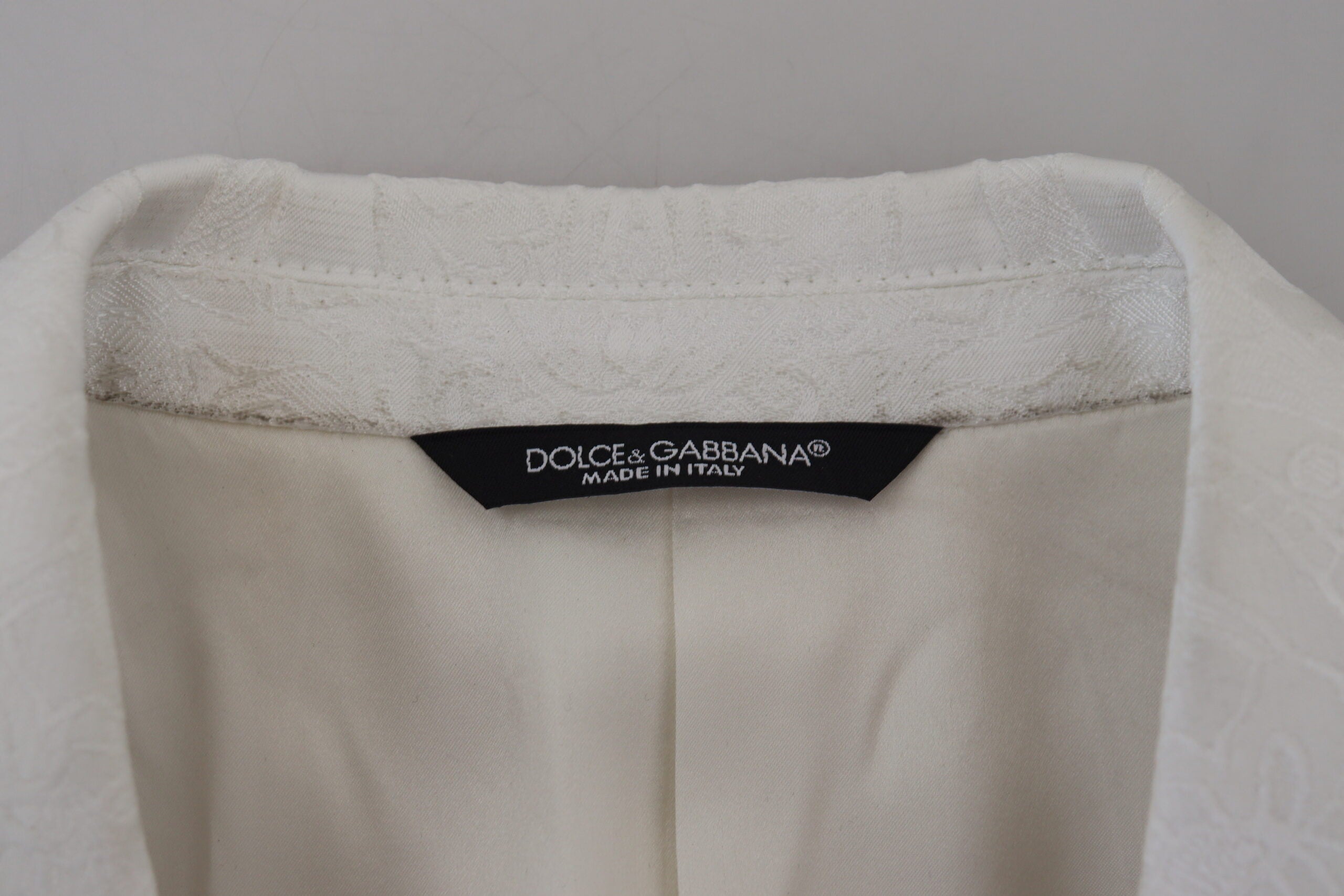 Dolce &amp; Gabbana Élégant trench-coat en brocart floral blanc