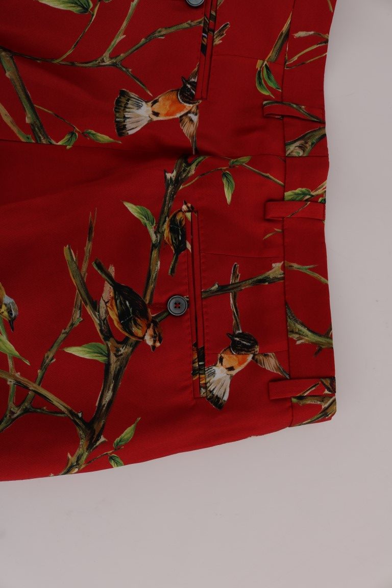 Dolce &amp; Gabbana Pantalon habillé élégant en soie à imprimé oiseau rouge