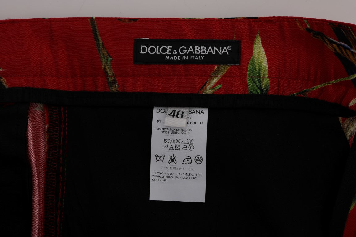 Dolce &amp; Gabbana Pantalon habillé élégant en soie à imprimé oiseau rouge