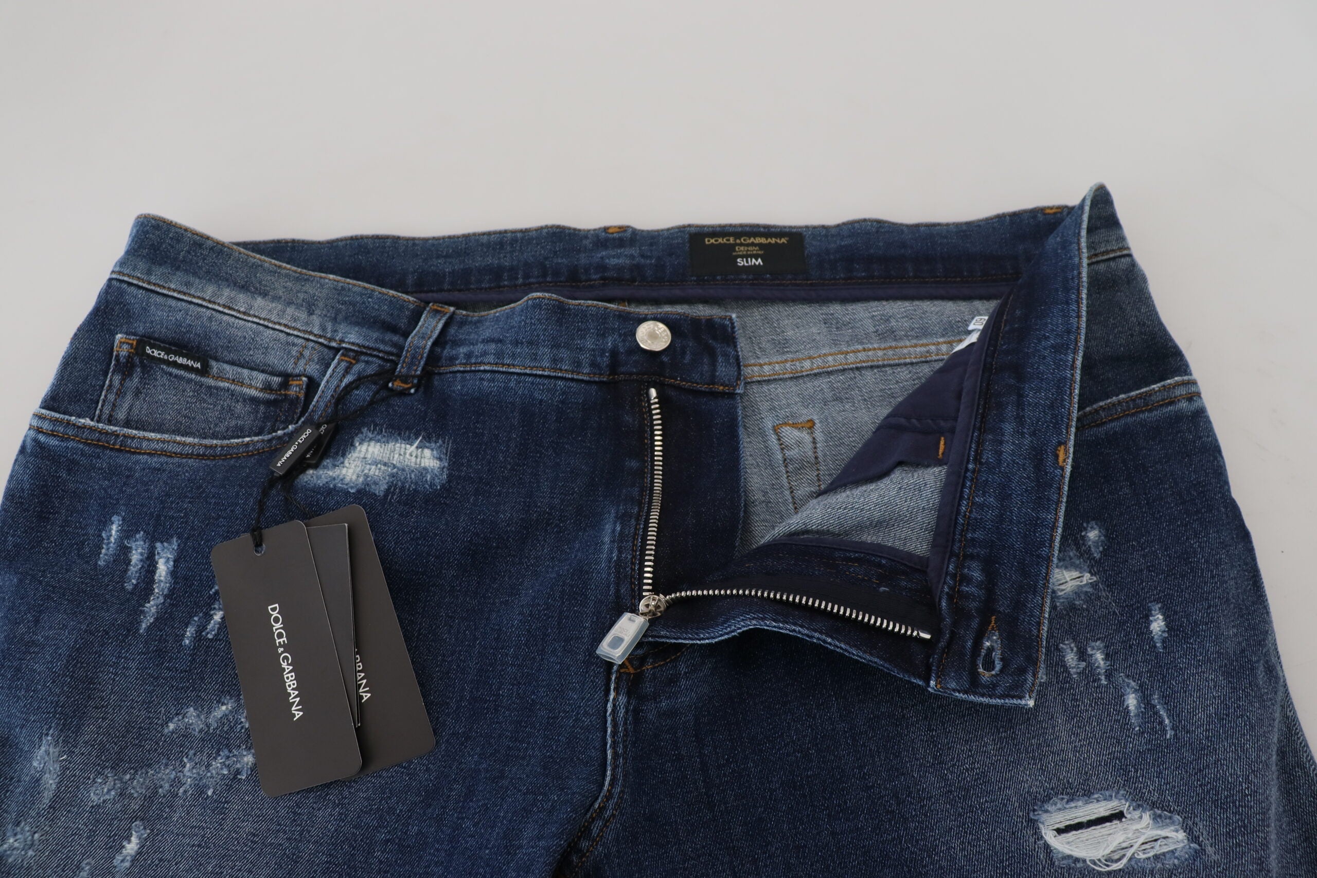 Dolce & Gabbana Jean slim en denim stretch en coton bleu en lambeaux