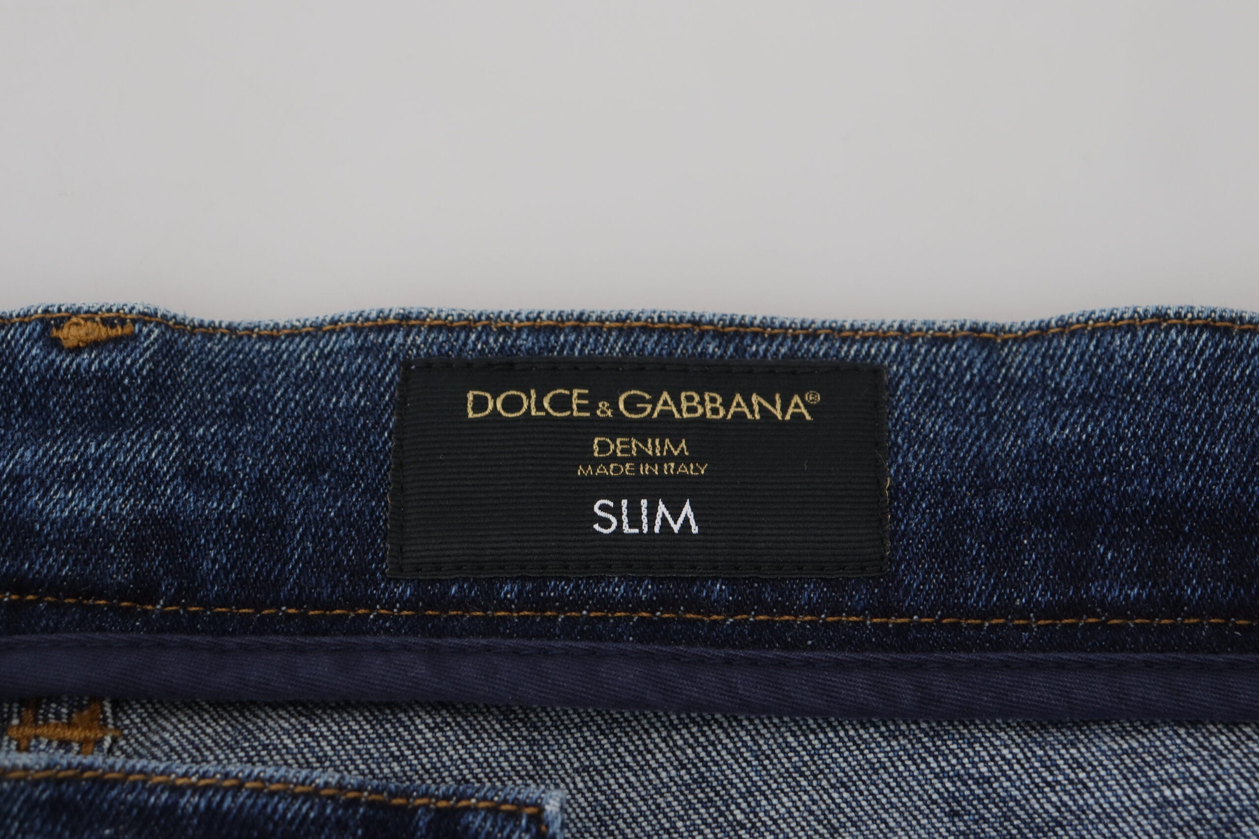 Dolce & Gabbana Jean slim en denim stretch en coton bleu en lambeaux