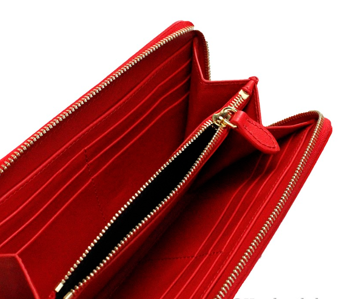 Portefeuille d'embrayage continental en cuir avec logo en relief rouge Burberry Elmore