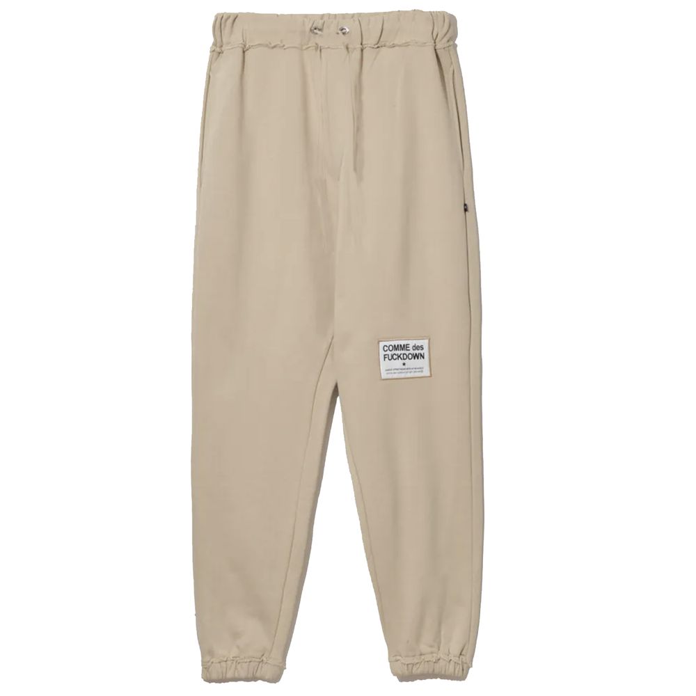 Comme Des Fuckdown Pantalon de survêtement chic en coton beige avec détails effilochés