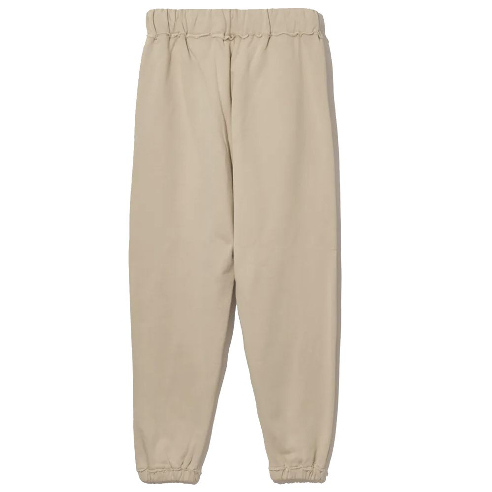 Comme Des Fuckdown Pantalon de survêtement chic en coton beige avec détails effilochés