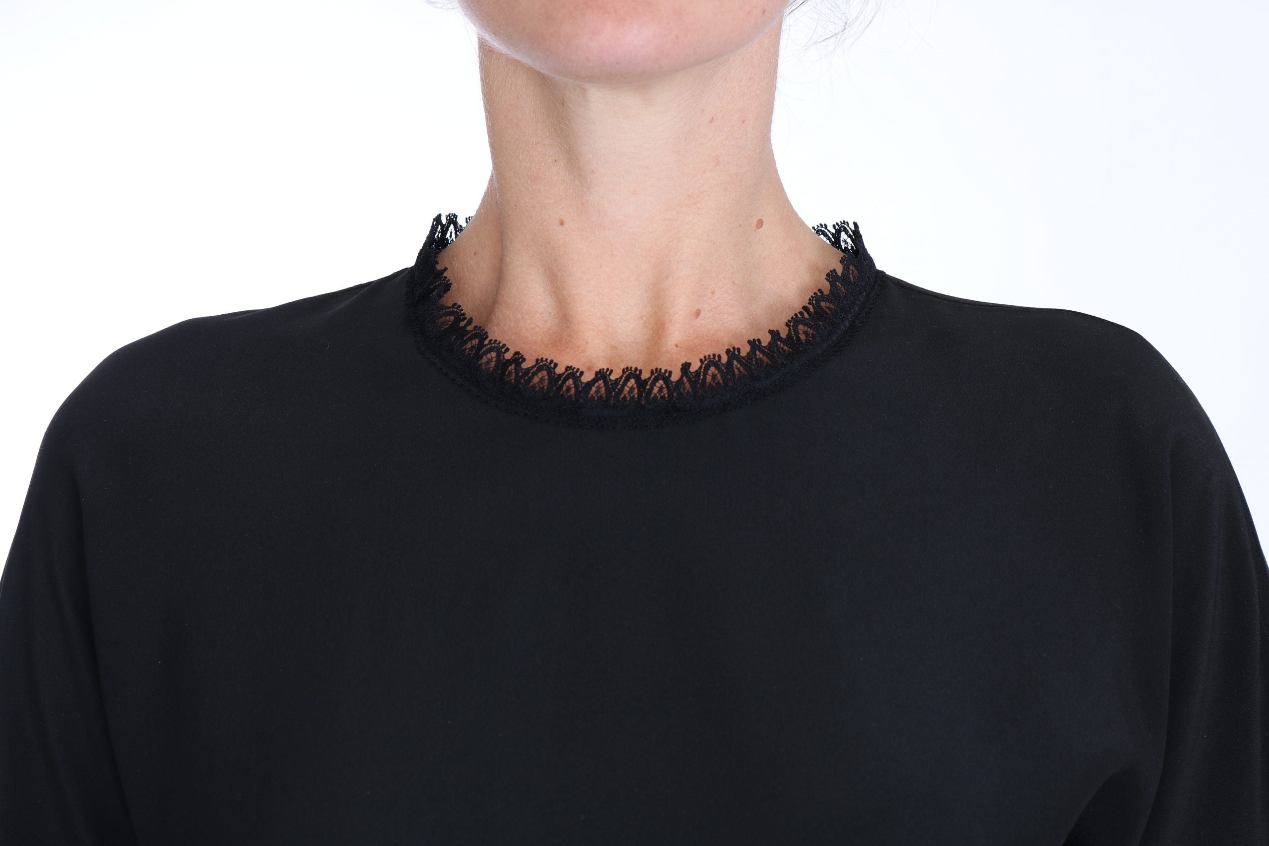 Dolce &amp; Gabbana Blouse élégante en soie détaillée en dentelle