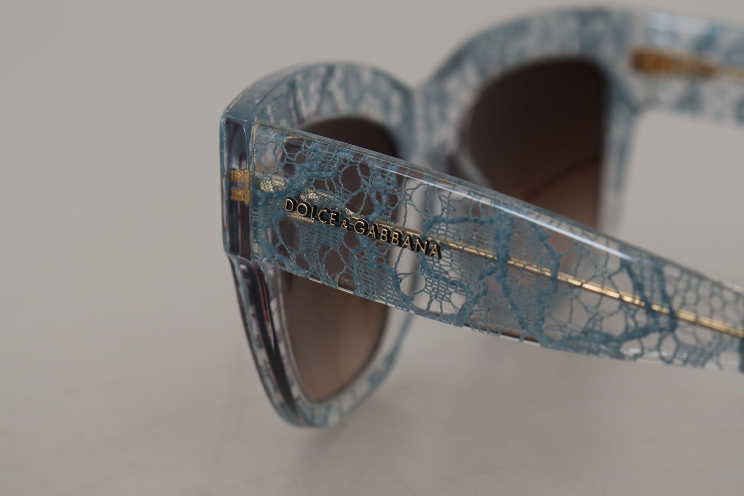 Dolce &amp; Gabbana Lunettes de soleil bleues élégantes avec détails en dentelle