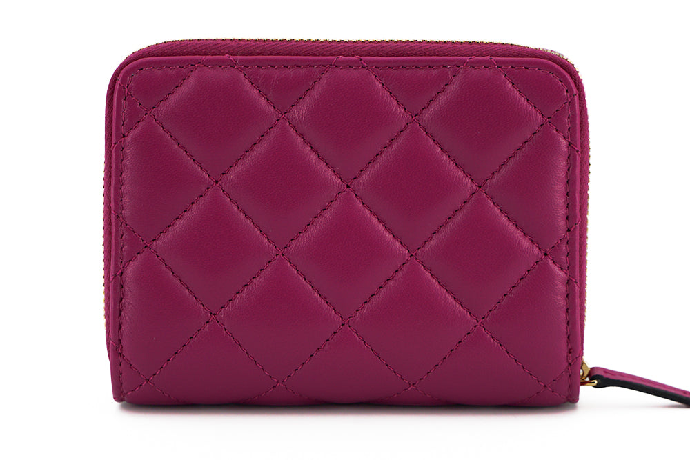 Versace élégant portefeuille en cuir matelassé violet